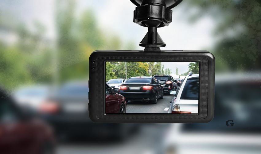 modern dashboard camera mounted in car view of road during driving